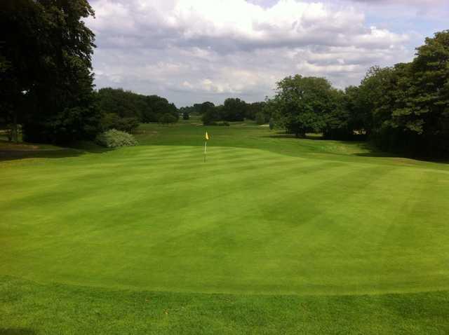 The 18th green at Sale Golf Club