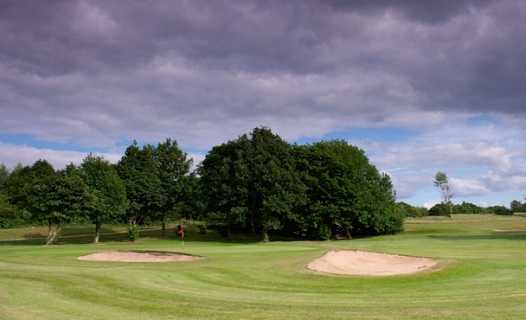 A view of green protected by bunkers at Tapton Park Golf Course