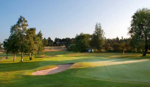 A view of a hole protected by bunkers at North Warwickshire Golf Club
