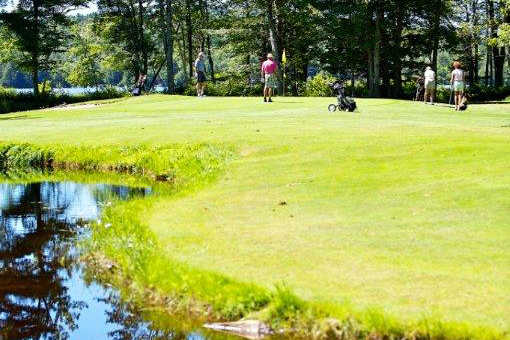 A sunny day view from Twin Lake Village Par 3 Golf Course