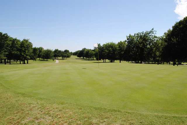 A view of a green at Woods Golf Course