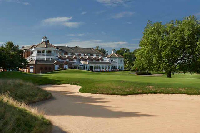 View of the 18th hole and clubhouse from PGA National Course at the Belfry Golf Club