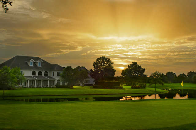 A view of a hole and the clubhouse at Craft Farms Resort