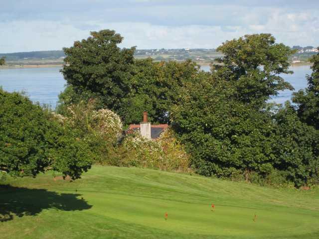 The putting green overlooking the sea at Caernarfon Golf Club