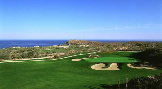 A sunny day view of a hole at Cabo del Sol Course.