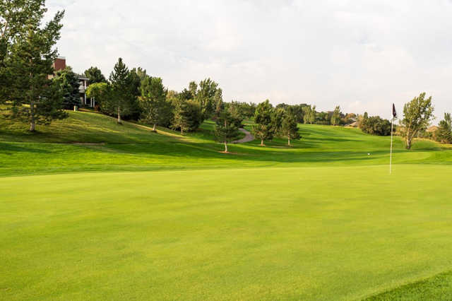 A sunny day view of a hole at Eaglewood Golf Course.