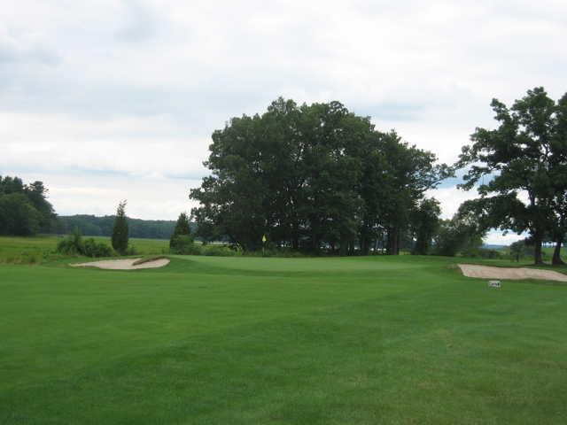 A view of a green flanked by bunkers at Portsmouth Country Club (Dean Merrrill).