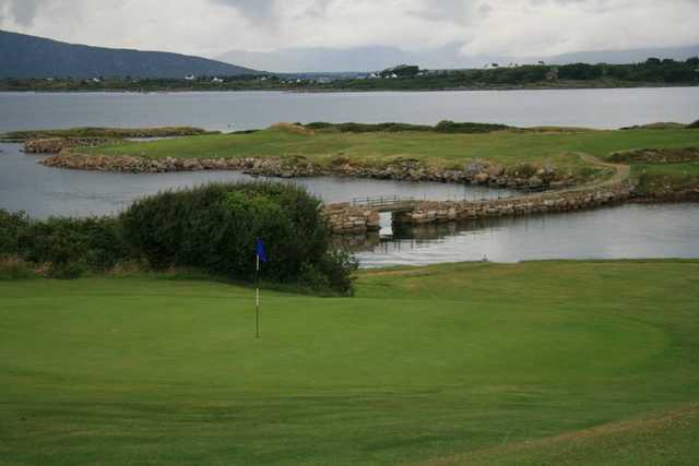 A view of a green with water coming into play at Connemara Isles Golf Club