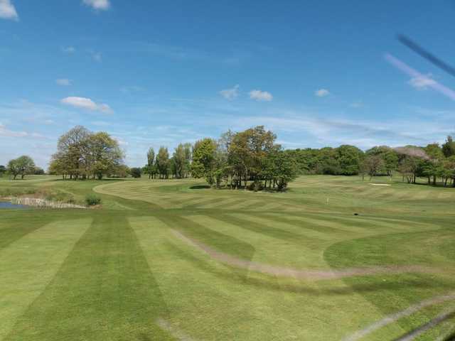 A view of green and fairway #10 at Balcarres Course from Haigh Woodland Park.