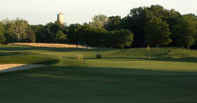 A sunny day view of a hole at The Fort Golf Resort.