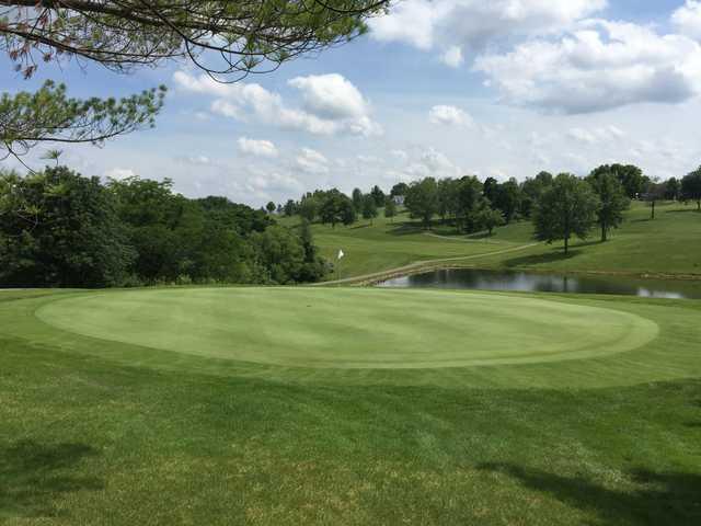 A view of a hole with a pond in background at Hidden Valley Golf Club.