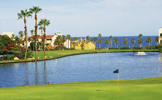 View of a green and lake at Vidanta Golf Los Cabos