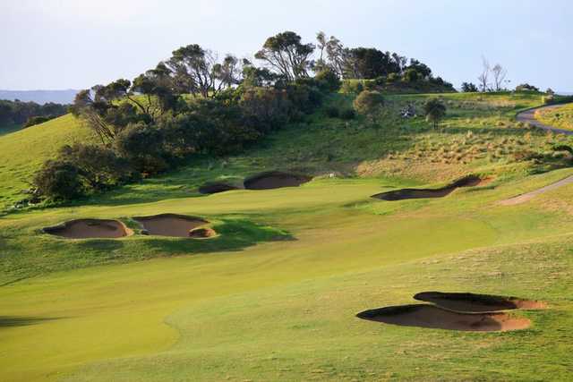 A view of a hole protected by bunkers at The Dunes Golf Links