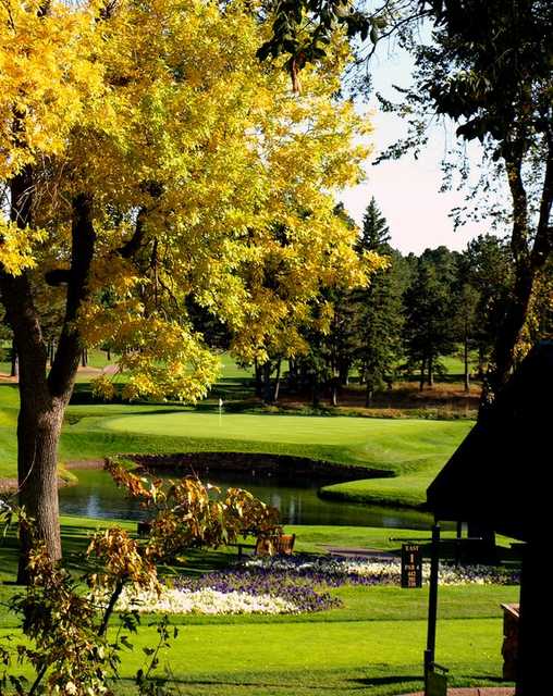 A fall view of a green at Broadmoor Golf Club