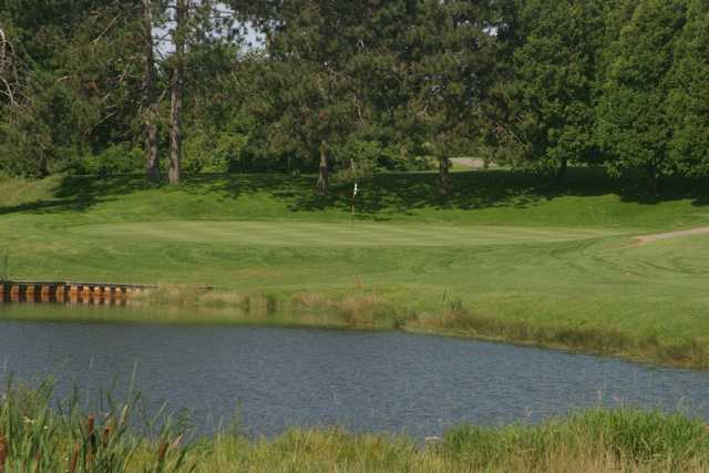 A view over the water of a hole at Williston Golf Club