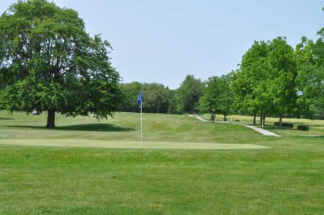 A view of a hole with a narrow path on the right side at Hawk's Tail of Greenfield