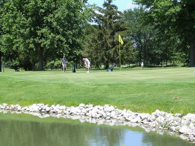 A view of green with water coming into play at Colonial Oaks Golf