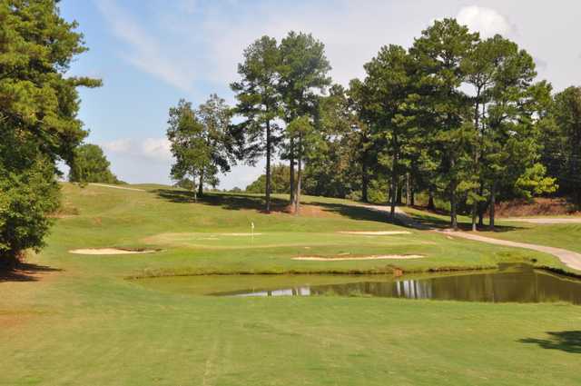 A view of a green with water coming into play at Alpine Bay Resort