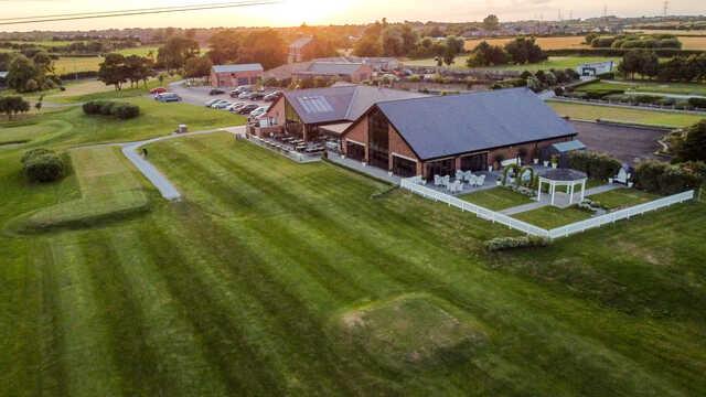 Aerial view of the clubhouse at Staining Lodge Golf Course.