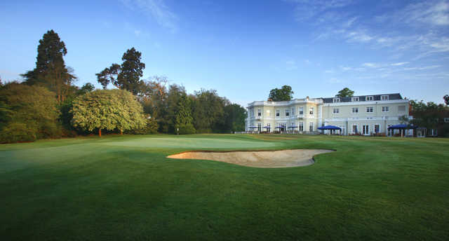 A view of the 18th green with the clubhouse in background at New Course from Burhill Golf Club