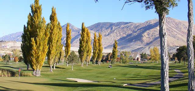A fall day view of a fairway at Eagle Mountain Golf Course.