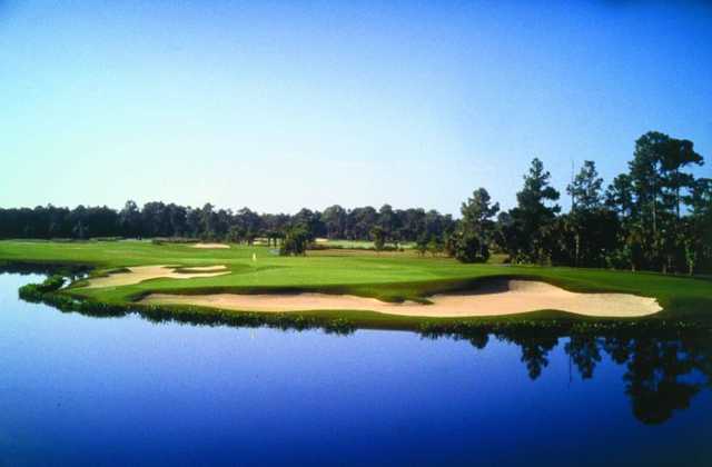 A view of hole #18 protected by bunkers at Cypress Course from Bonita Bay East