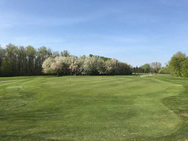 A spring day view of a green at Bel Acres Golf and Country Club.