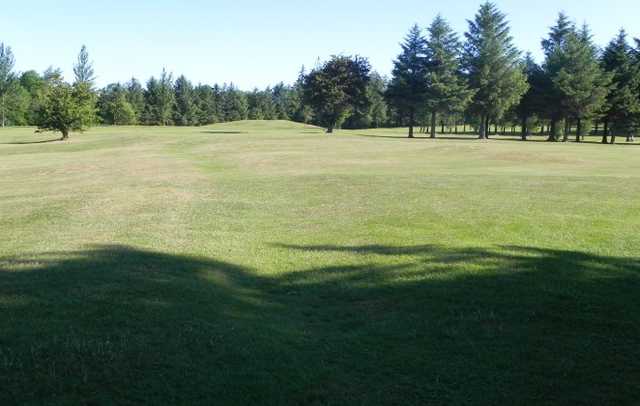 A sunny day view of a fairway at Carrick-on-Shannon Golf Club
