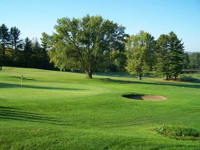 A sunny day view of a hole at Mojalaki Country Club