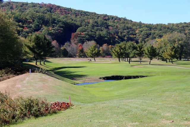 A view of the 12th hole protected by bunkers at White Mountain Country Club
