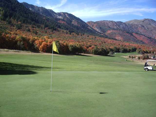 A fall view of a green at Sherwood Hills Golf Course