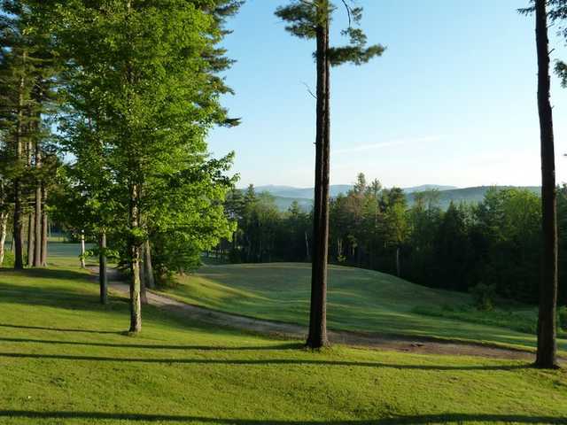 A view from hole #14 with Mt Cardigan in background at Ragged Mountain Golf Club
