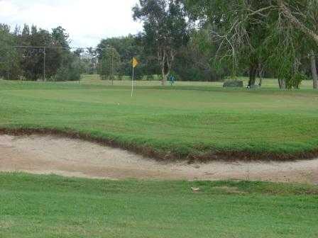 A view of green protected by sand trap at Sandgate Golf Club