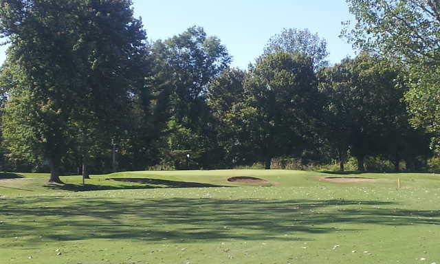 A view of the 7th green protected by bunkers at Princeton Country Club