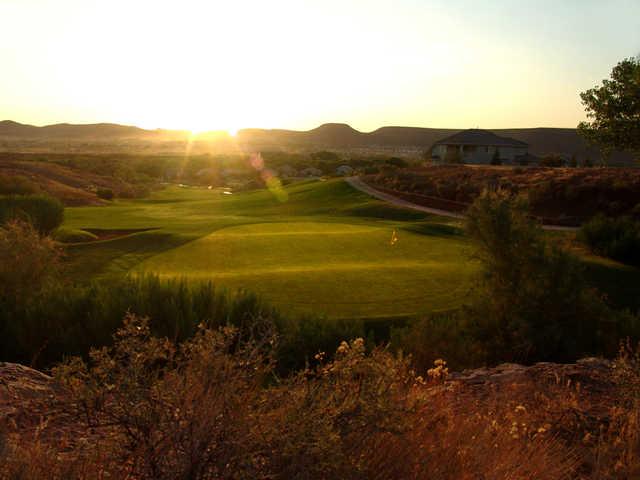 A sunny view of a green at Sunbrook Golf Club