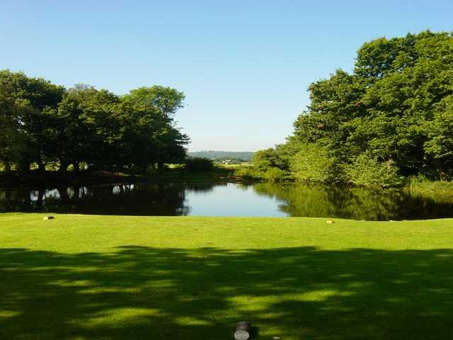 Daunting 18th tee shot over water at Hawkesyard Golf Course