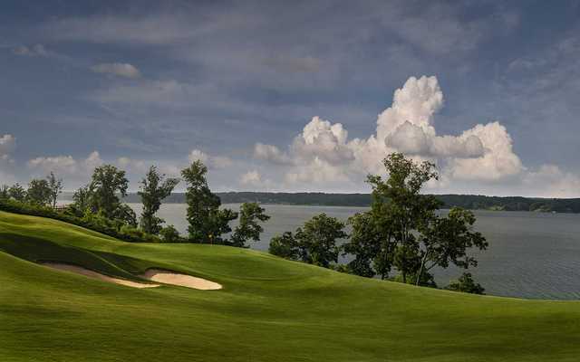 A view of the 18th hole with water in background at Fighting Joe Course from Shoals Golf Club
