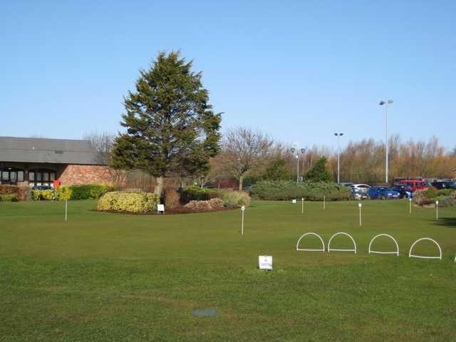 The putting green and carpark at Herons' Reach Golf Resort