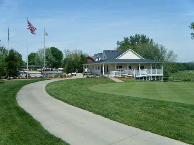 A view of the practice putting green and clubhouse in background at Buffer Park Golf Course