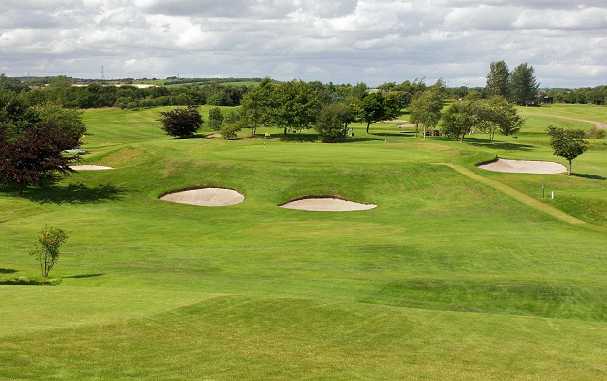 A view of the 8th green protected by bunkers at Bathgate Golf Club