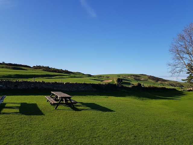 A sunny day view from Cleeve Hill Golf Club.