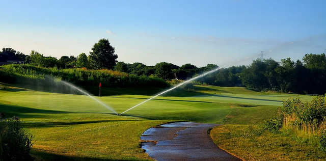 A sunny day view of a hole from The Course at Aberdeen.