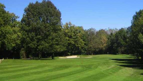 A view of a hole guarded by sand traps at Saddlebrook Golf Club