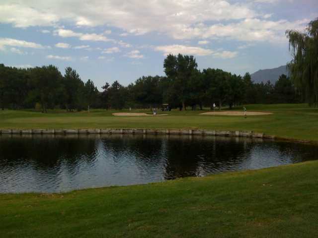 A view of green with water coming into play at Hidden Valley Country Club