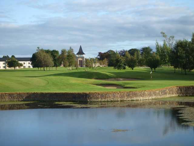 A view over the water of a hole at Ballykisteen Golf and Country Club.