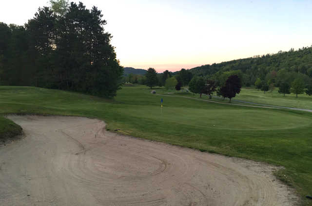 An evening view of a green at Newport Golf Club.