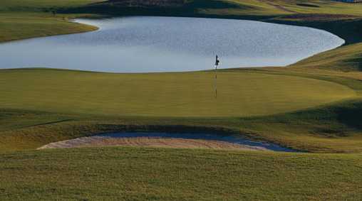 A view of a green with water coming into play at Rose Creek Golf Club