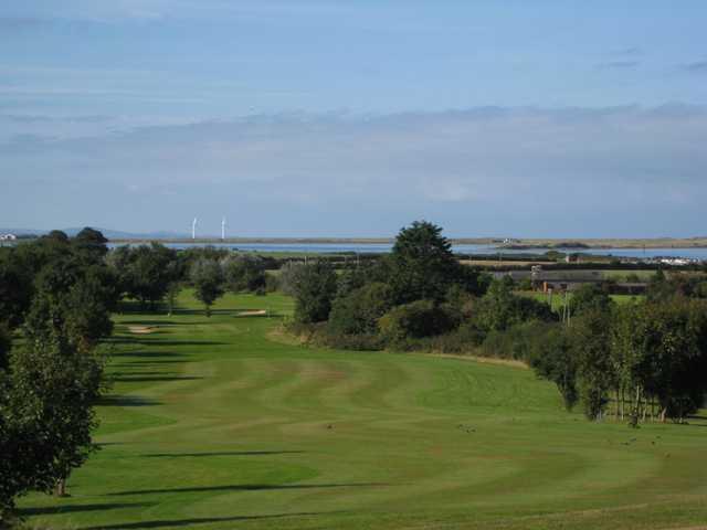 A view of the 18th fairway overlooking the sea at Caernarfon Golf Club