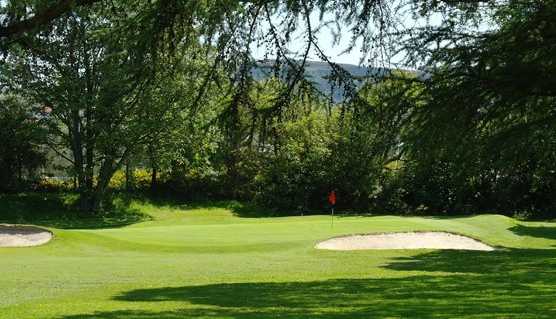 A view of hole #10 guarded by bunkers at Dumbarton Golf Club