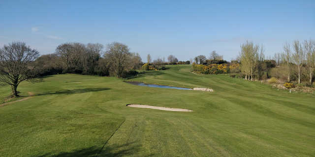 A spring day view of a hole at Mayobridge Golf Club.
